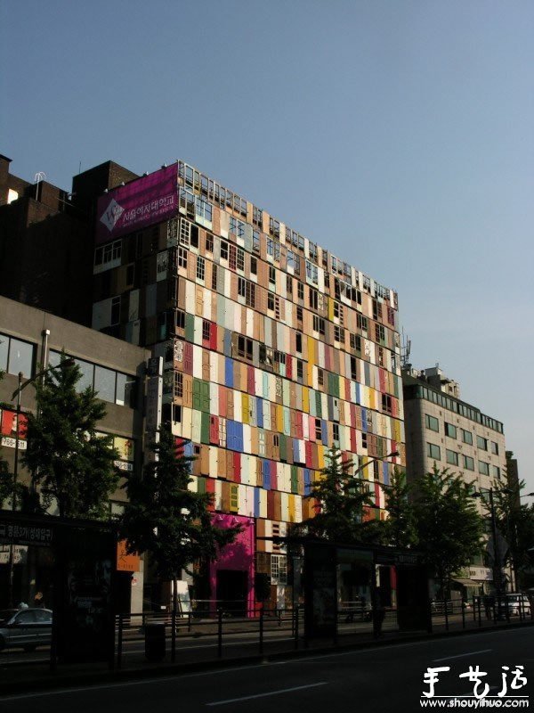 A building decorated with old doors