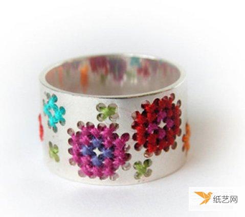 Picture of handmade wire wound metal ring, it looks like it is embroidered!