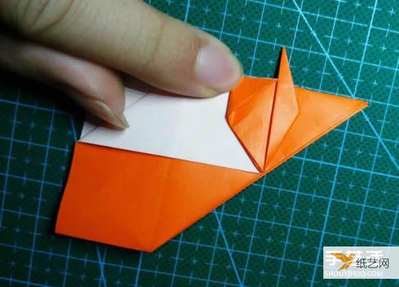 Detailed explanation of the manual method of folding a paper kingfisher tutorial.