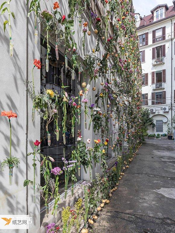 Milan designer woven 2,000 flowers into a curtain to decorate the exterior wall