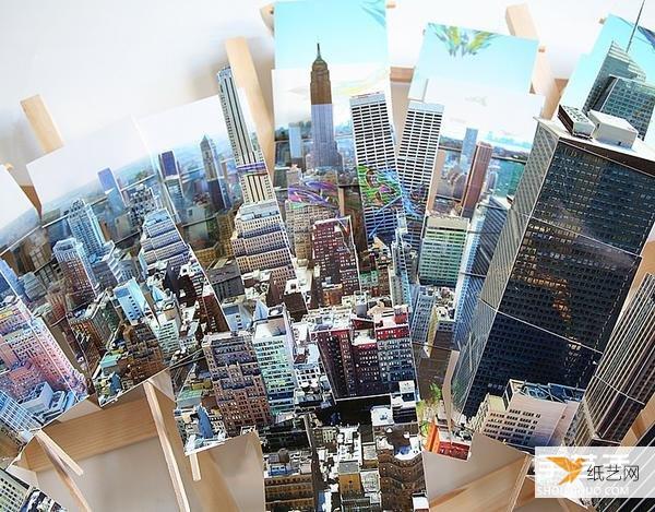 Three-dimensional city paper sculpture art: splicing multiple photos into a panoramic picture