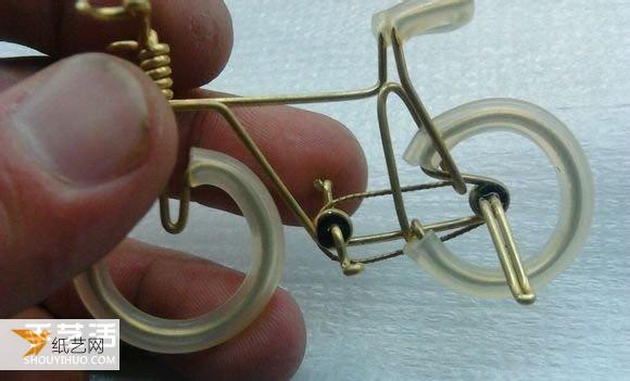 Illustrated tutorial for making a compact bicycle by hand using copper wire