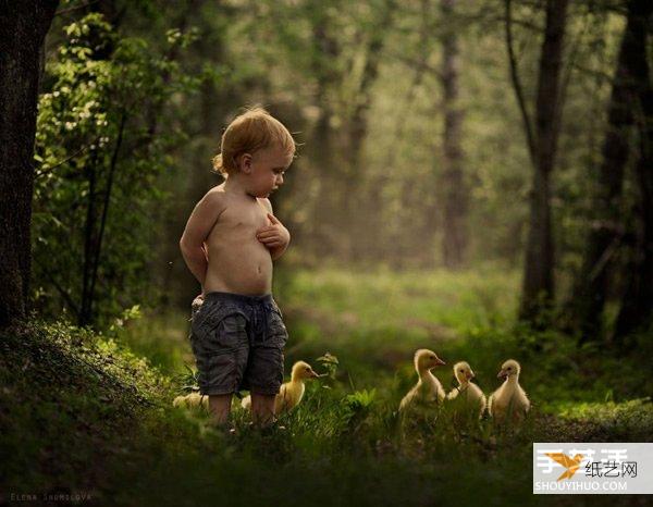 Appreciate the warm photography of a very cute little boy and animals