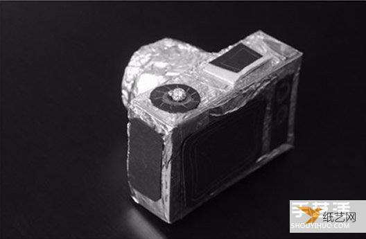 Tutorial on how to make a personalized children’s toy camera using a paper roll and a paper box