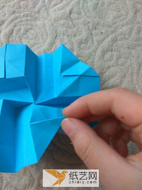 Improved Kawasaki Rose Folding Illustrated Tutorial. Actual photos teach you how to fold paper roses.