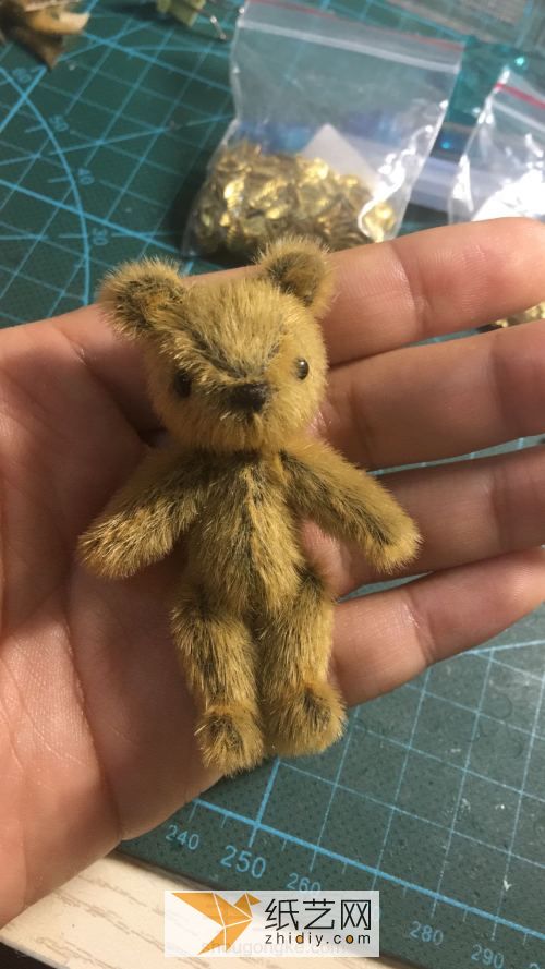 A birthday gift for the furry bear made from wool felt poking fun