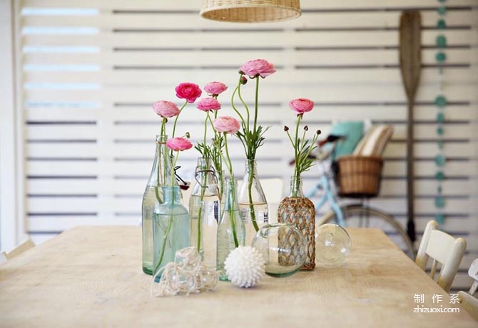 Beach hut decorated with coastal flowers