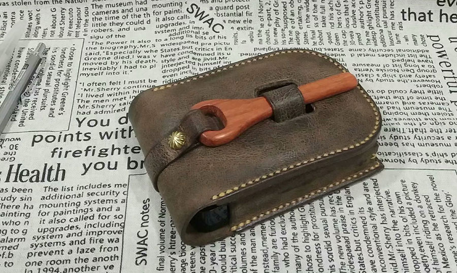 Mahogany buckle storage bag, from leather friends who know carpentry