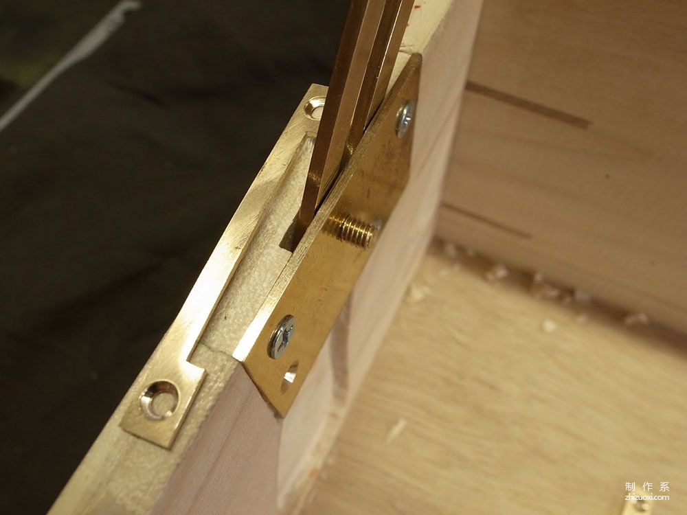 The process of Japanese craftsman Yukihiro Fujii making a leather suitcase based on a wooden box frame