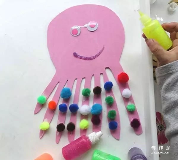 Children make octopus stickers