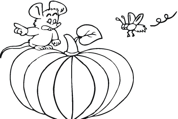 Mouse standing on pumpkin