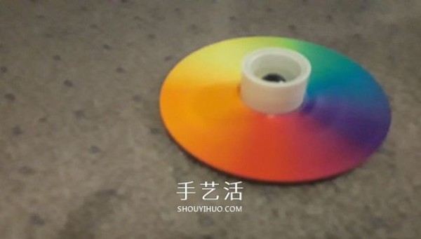 Tutorial on making rainbow top toys from old CDs