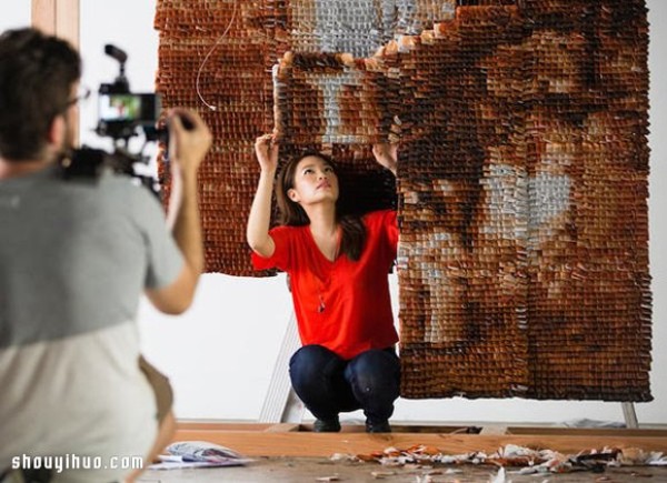 Twenty thousand tea bags create a large portrait of a "Teh Tarik Man" Like