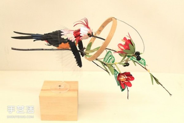 Realistic pictures of handmade paper birds put you in a world of singing birds and fragrant flowers