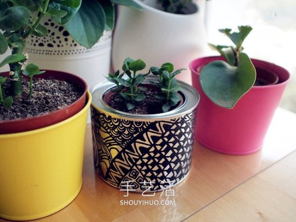 No need to spend a penny! How to transform hand-painted iron cans into flowerpots