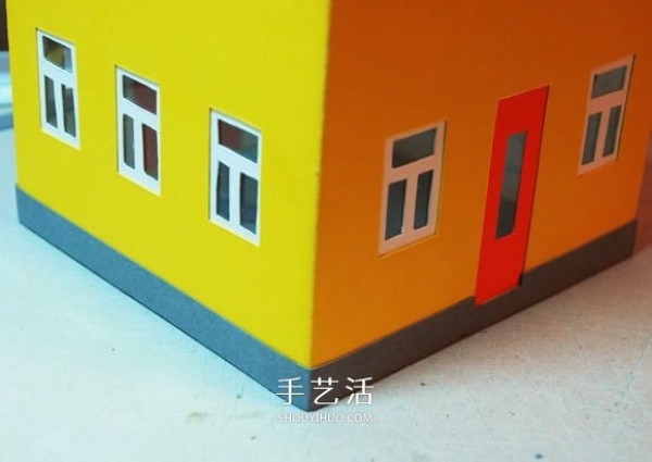 Handmade Christmas house model decoration from cardboard