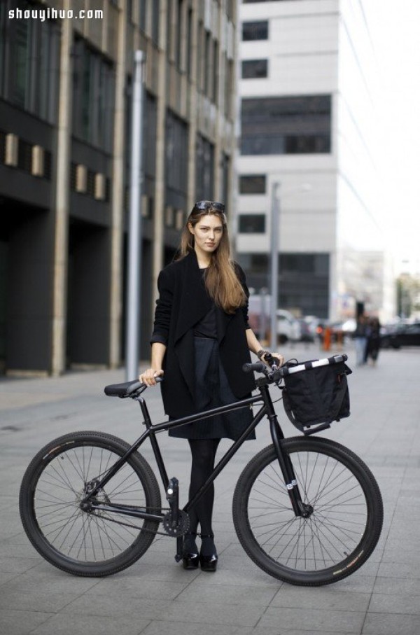 Moscows stylish bicycle girl travels elegantly in the urban area