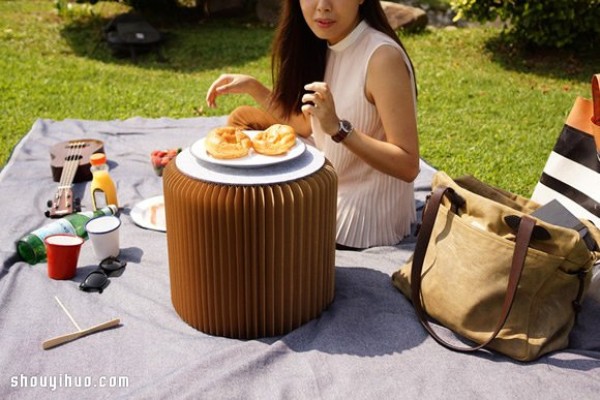 Bookniture A folding round table disguised as a hardcover book