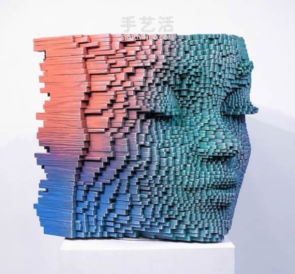 Vibrant pixelated wood carvings show the depth of the human soul