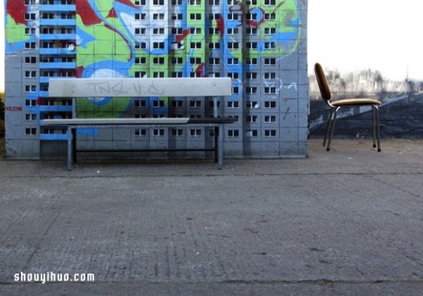 The cement piers and electrical boxes are transformed into houses with mini buildings and graffiti to beautify the environment