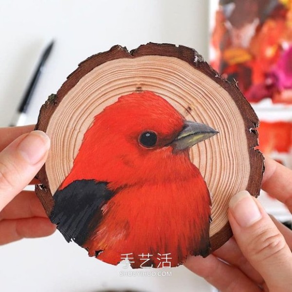 The artist spent 100 days painting 100 species of birds on wood chips