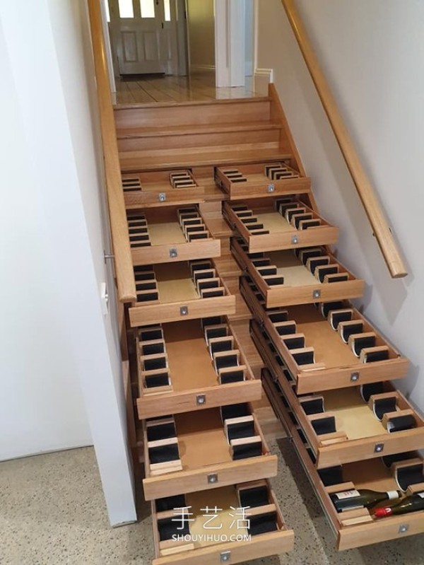 He transformed the stairs into a "wine cellar" that can store 156 bottles of red wine