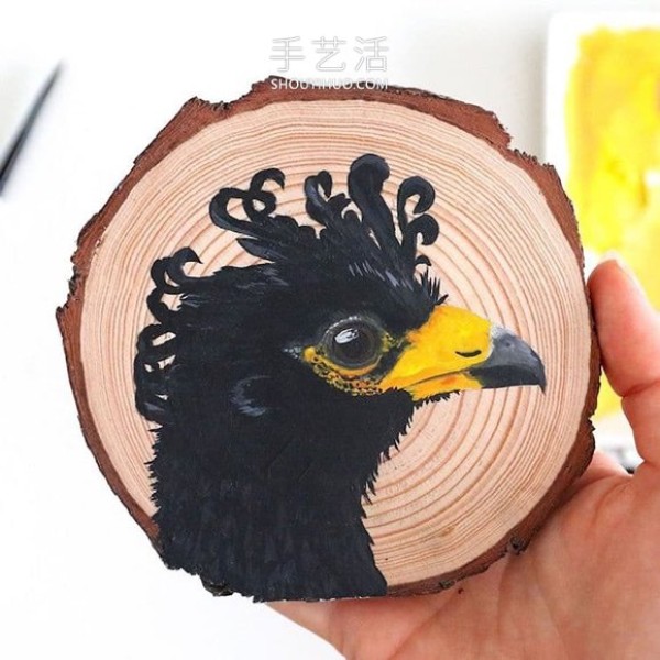 The artist spent 100 days painting 100 species of birds on wood chips