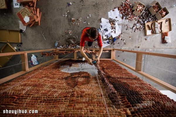 Twenty thousand tea bags create a large portrait of a "Teh Tarik Man" Like