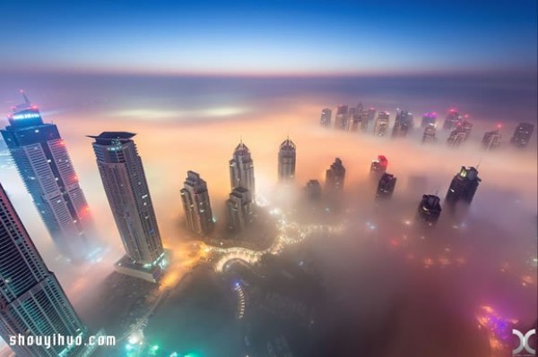 Photography of the city of Dubai on high buildings reveals the city of sky above the clouds and mist