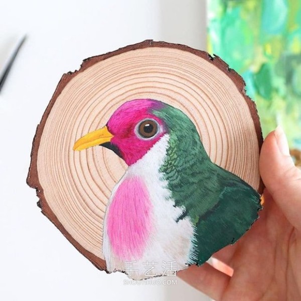 The artist spent 100 days painting 100 species of birds on wood chips