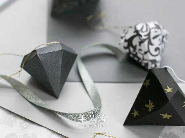 Handmade three-dimensional diamonds from cardboard become Valentines Day confession ornaments