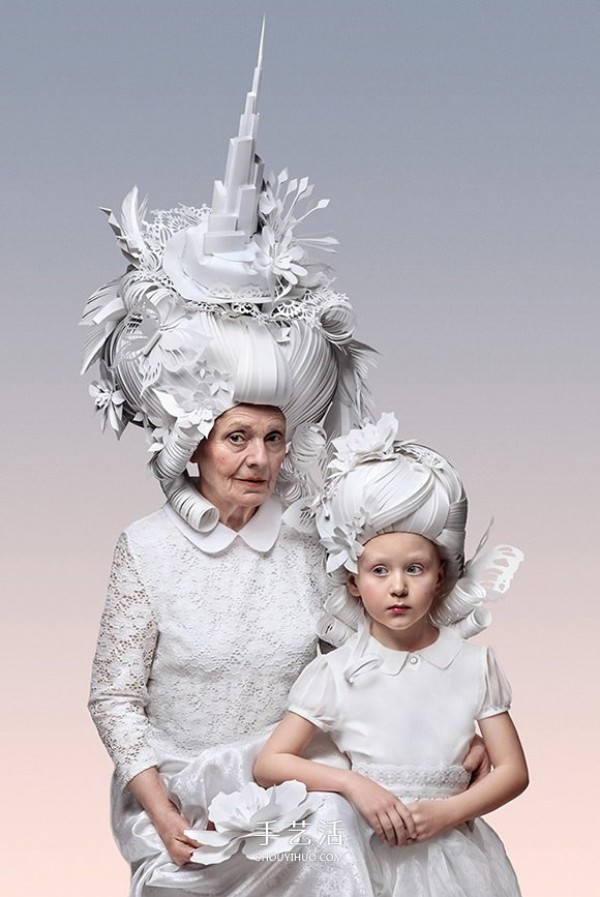 Pictures of paper sculptures of Baroque wigs interpreted by Russian paper sculptors