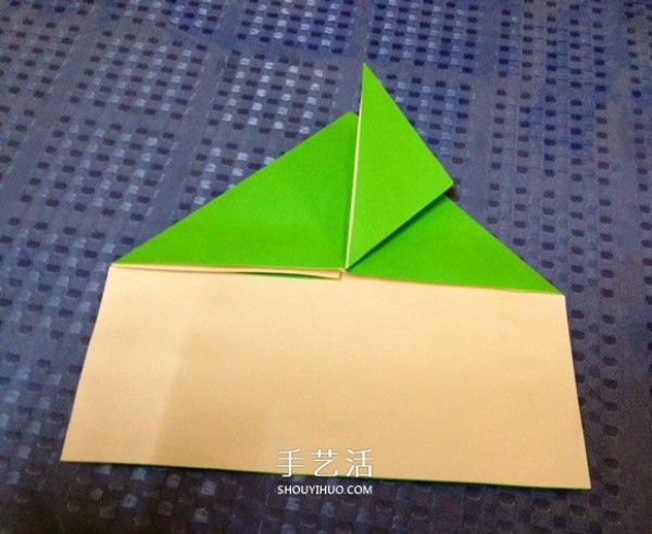 Detailed step-by-step illustration of a simple origami frog