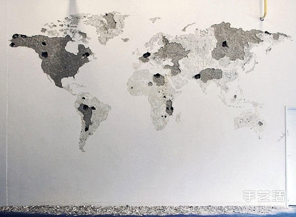 On a blank wall, DIY on a blank wall and tap on a whole side of the world map