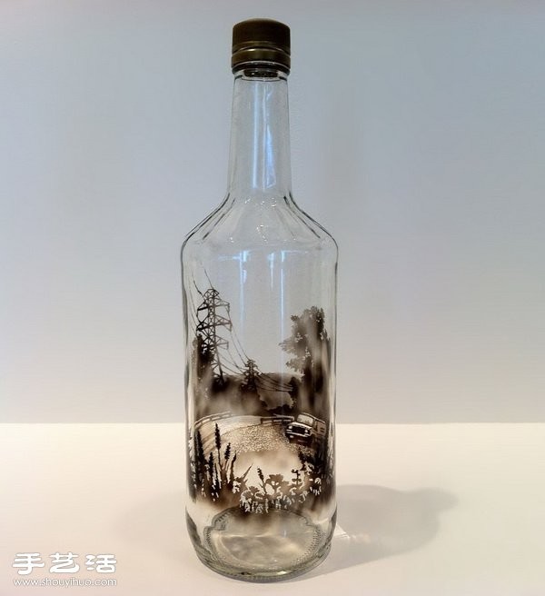 A realistic smoke painting is drawn on the inner wall of the glass bottle