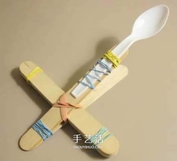 How to make a childrens toy catapult using an ice cream stick as a launcher device