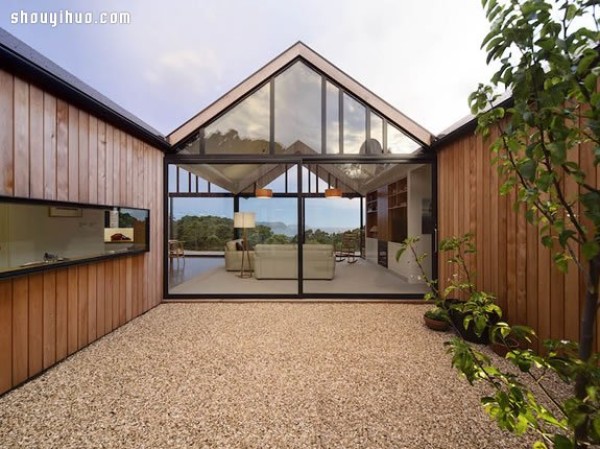 A spire villa designed with floor-to-ceiling glass and a sense of space