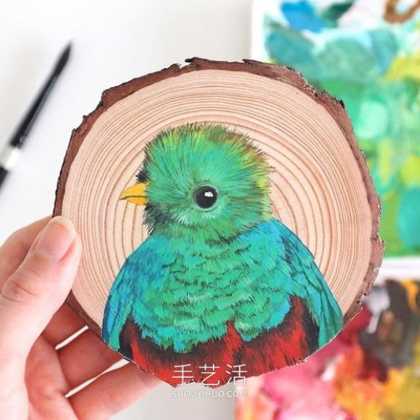 The artist spent 100 days painting 100 species of birds on wood chips