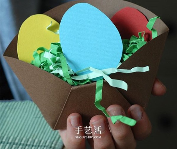 Tutorial for young children to make handmade Easter eggs using cardboard origami boxes