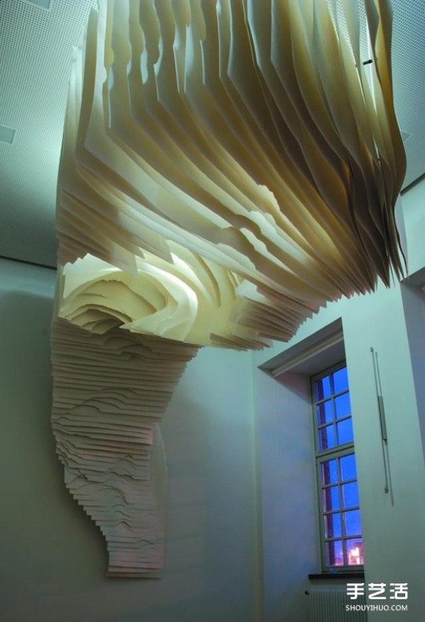 White paper with warm light to DIY a mysterious 3D paper sculpture