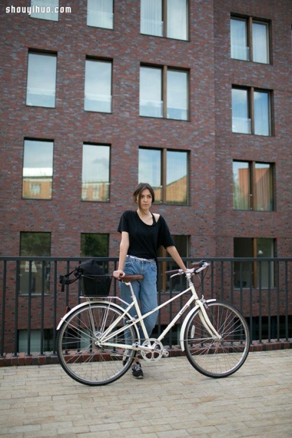 Moscows stylish bicycle girl travels elegantly in the urban area