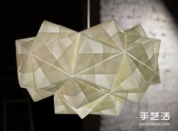 The New London Origami Queen creates artistic origami for three-dimensional lamps and furniture