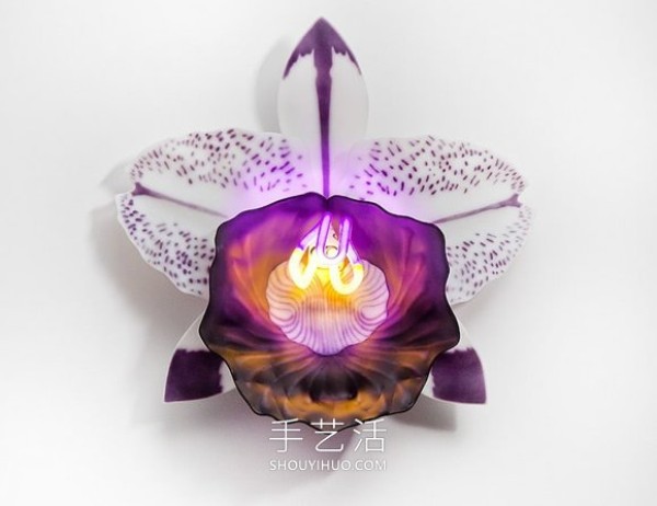 Glowing orchid sculpture artwork made of glass