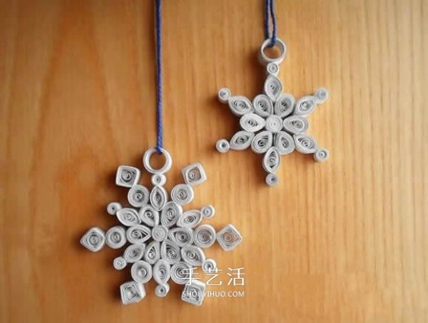 Detailed snowflake quilling tutorial and illustrations for DIY beautiful New Year hangings