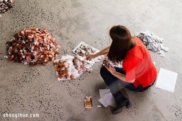 Twenty thousand tea bags create a large portrait of a "Teh Tarik Man" Like