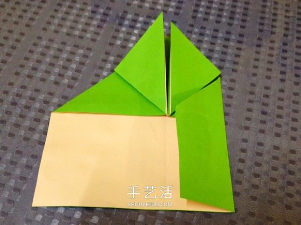 Detailed step-by-step illustration of a simple origami frog