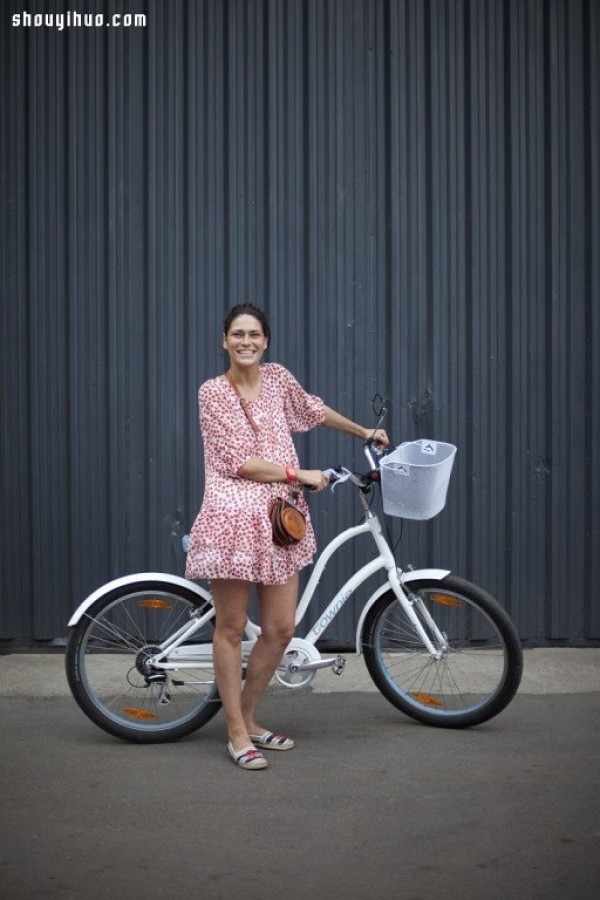 Moscows stylish bicycle girl travels elegantly in the urban area