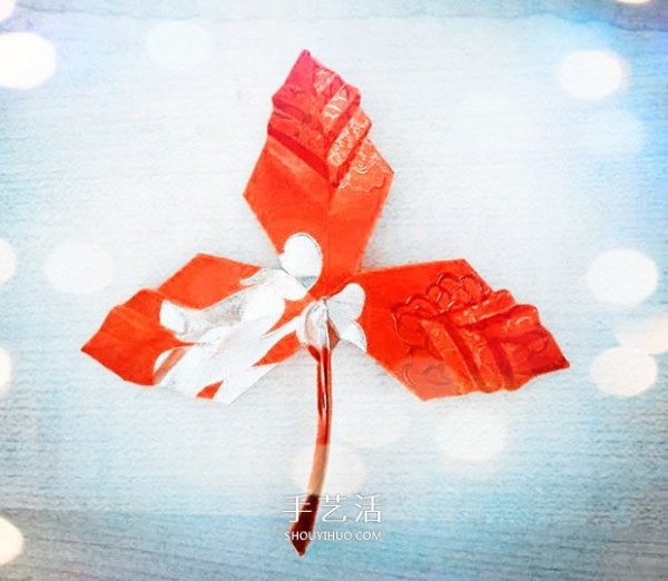 A simple origami maple leaf tutorial with red envelope and maple leaf folding instructions