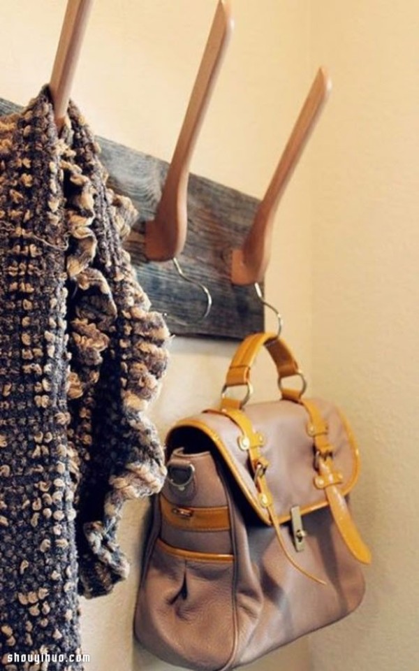 Wooden clothes hanger is handmade and transformed into a DIY super practical coat rack