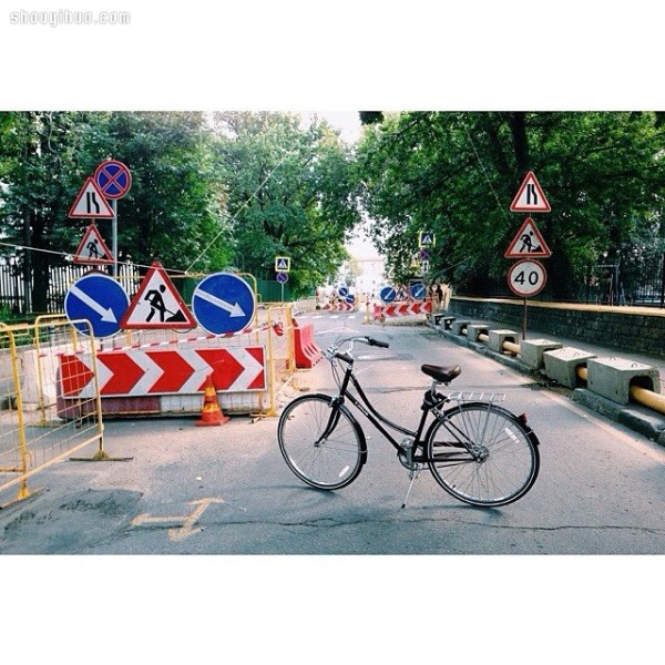 Moscows stylish bicycle girl travels elegantly in the urban area